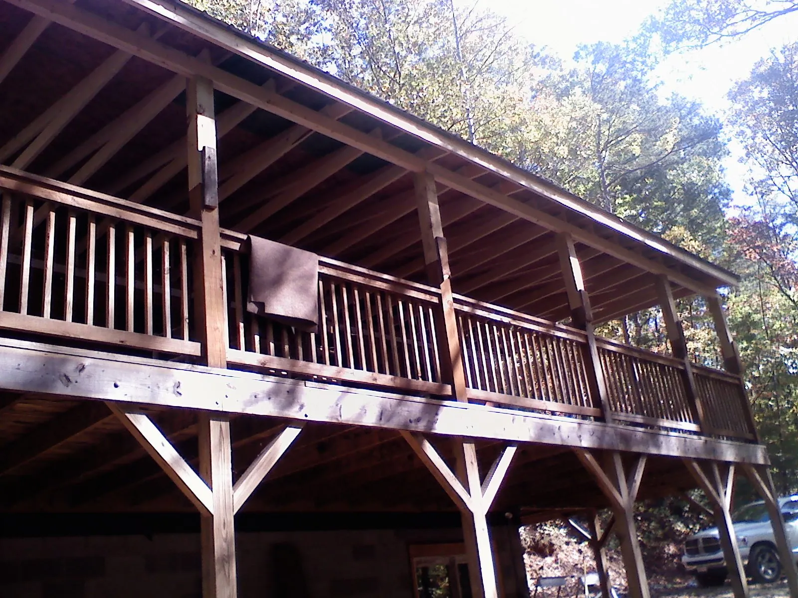 Timber framing under a new elevated porch and deck — Roof Leak Repair in Osseo by Roofing Brothers